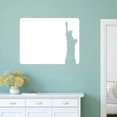 Dry-erase board with Statue of Liberty design in a blue room with light furniture.