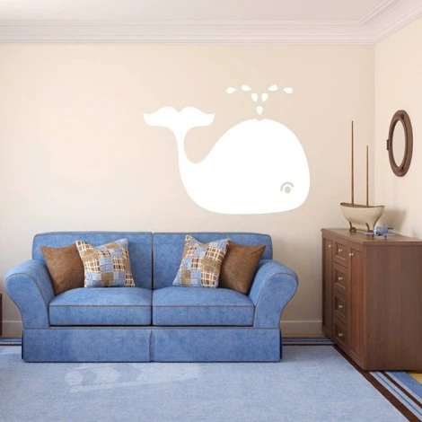 Whale dry-erase board 100 - Living room setup with light walls and a blue couch with plaid cushions.