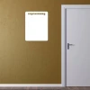 Dry-erase board in a room with a brown wall. The board has a rectangular shape.