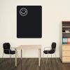 Chalk sticker smiley face 163 - Office setup with light-colored wall, dark table, and chairs.