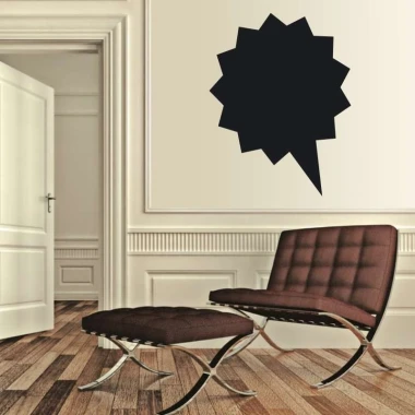 Chalk sticker speech bubble 165 - Living room decor with light walls, wooden floor, and dark furniture.