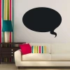 Chalk sticker speech bubble 173 - Living room setup with striped walls and dark-colored furniture.