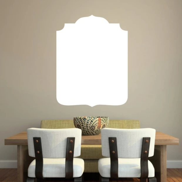 Whiteboard 130 - Dining room setup with light walls, wooden table, and chairs with light upholstery.