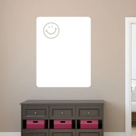 Dry-erase board with a smiley face 163 - Styled in a room with light walls and dark furniture.