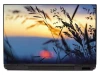 Sunset laptop sticker P269 - Graphic design featuring silhouettes of grass against a sunset backdrop.