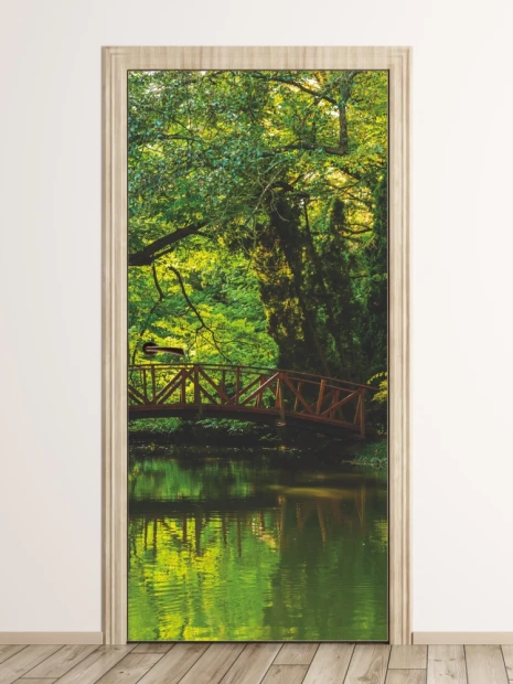 Forest bridge door mural P73 - Room decor featuring green trees and a bridge over water.