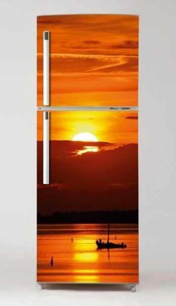 Sunset fridge wrap sticker P65 - Graphic design featuring a sunset over water with a boat.