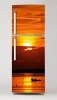 Sunset fridge wrap sticker P65 - Graphic design featuring a sunset over water with a boat.