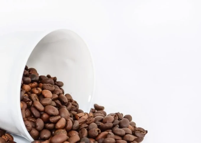 Dry-erase board 208 coffee - Graphic design featuring coffee bean shapes in shades of brown on a white background.