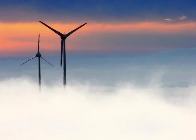 Dry-erase board 221 wind turbines - Graphic design featuring two turbine rotors against clouds and sunset.