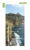 Rock Door Mural P491 - Graphic design featuring a cliff with buildings on top and the sea.