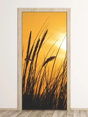 Grass door wallpaper P493 - Graphic design with dark grass silhouettes against an orange sky.