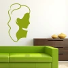 Sticker 03X 09 female profile 1906 - Graphic design featuring a silhouette of a woman with long hair in green.