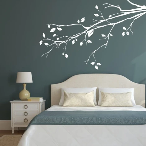 Sticker 03X 14 branch 1931 - Bedroom arrangement with dark walls and a bed featuring light bedding.