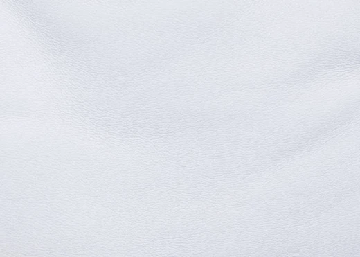 White dry-erase magnetic board with a smooth surface and subtle texture, featuring a graphic design.