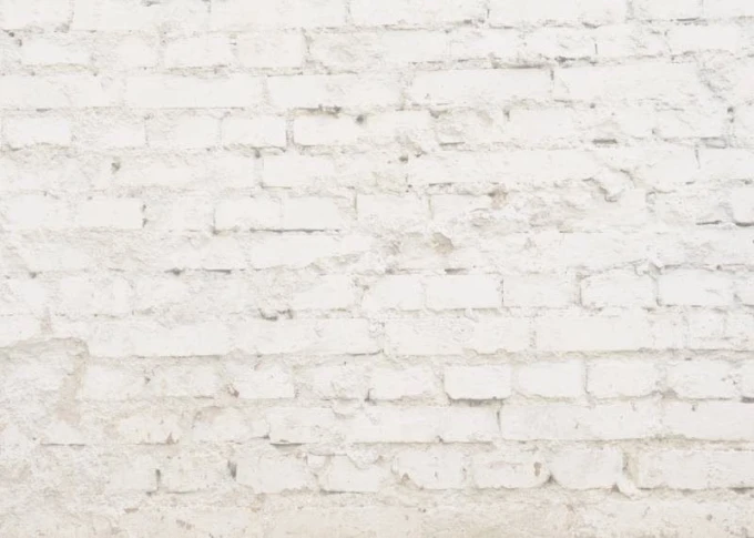 Magnetic dry-erase board with a brick design featuring a textured white brick surface.