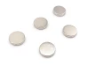 Set of 5 neodymium magnets in various sizes - round, metallic design.