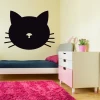 Chalkboard cat head sticker 197 - Decor for a child\'s room with light walls, wooden floor, and pink rug.
