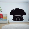 Chalkboard mushroom sticker 210 - Decor for a child\'s room with light walls and neutral-colored furniture.