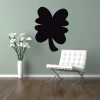 Chalk sticker clover 185 - Room decor with light walls, wooden floor, and modern furniture.