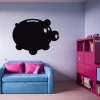 Chalkboard sticker piggy bank 215 - Room decor with light walls and furniture in shades of pink and blue.