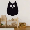 Chalk sticker owl 188 - Decor for a child\'s room with light walls, wooden furniture, and toys.