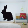 Chalkboard bunny sticker 189 - Decor in a children\'s room. Light-colored walls, light wood furniture.