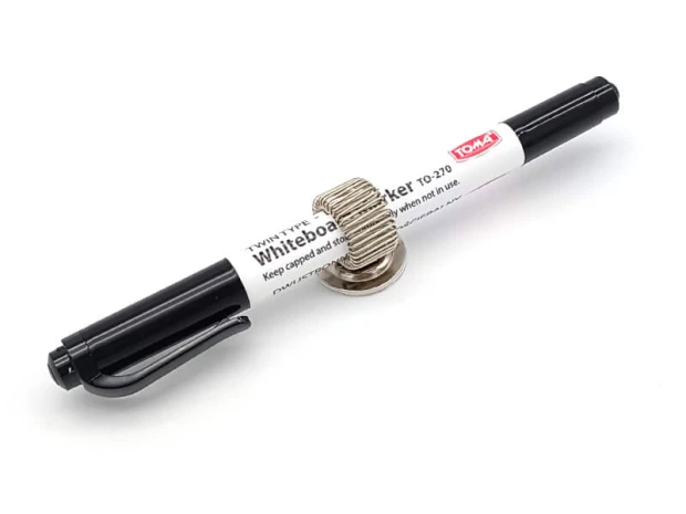 Metal adhesive holder for markers/pens - Graphic design. The holder in a spring shape wraps around the pen.