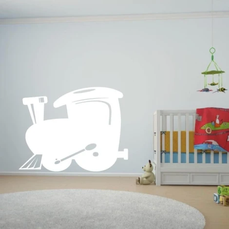 Train-shaped whiteboard 208 - Decor in a child\'s room with light-colored walls, a crib, and toys nearby.