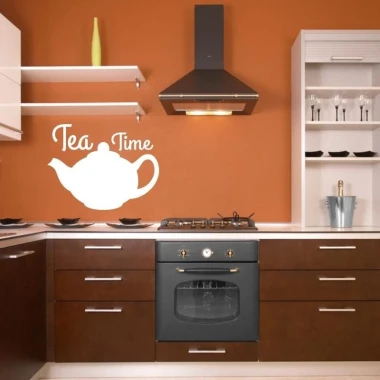 Tea time dry-erase board 211 - Kitchen setup with orange walls and brown and white furniture.