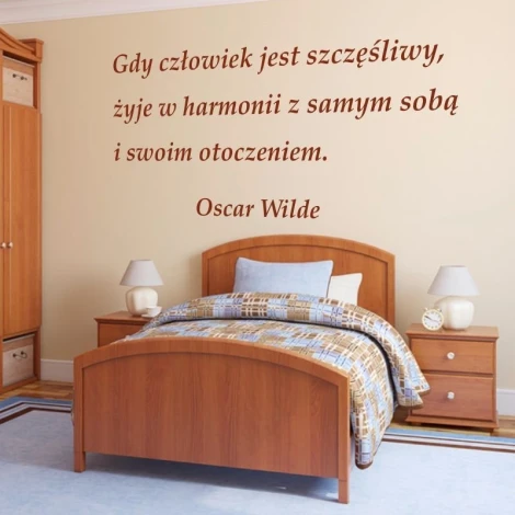 Sticker "When a person is happy 1957" - Bedroom decor with light walls, wooden furniture, and a bed.