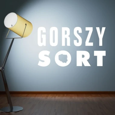 Sticker "Lower Quality" 1950 - Room setup with blue wall, wooden floor, and floor lamp.