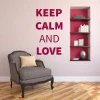 Keep calm and love 1947 sticker - Living room setup with light-colored walls and one red accent wall, wooden elements.