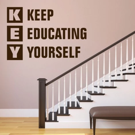 Key 1953 sticker - hallway decor with light-colored walls, wooden stairs, and a minimalist style.