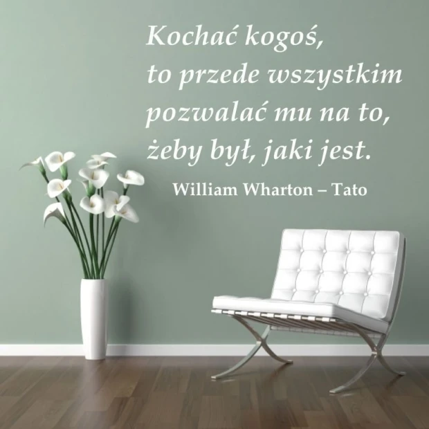 Love someone sticker 1961 - Living room setup. Light-colored wall, white flowers in a vase, modern chair.