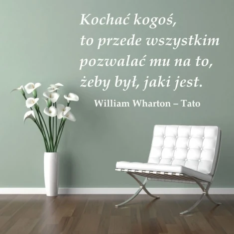 Love someone sticker 1961 - Living room setup. Light-colored wall, white flowers in a vase, modern chair.