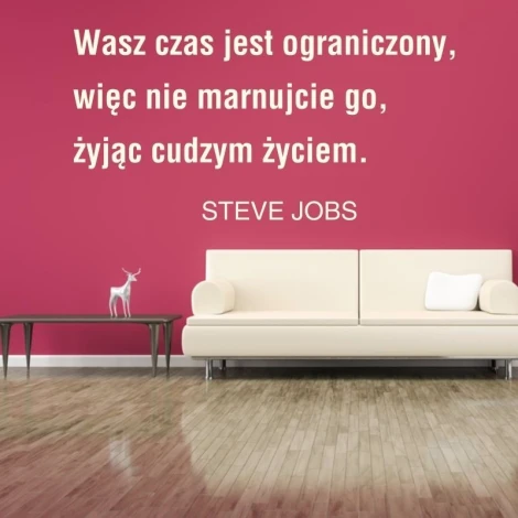 Sticker "Your time is limited 1956" - Living room setup with pink wall, wooden floor, and white corner sofa.