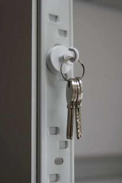 Hook magnet in various sizes - Office arrangement. Gray-beige walls, minimalist style.