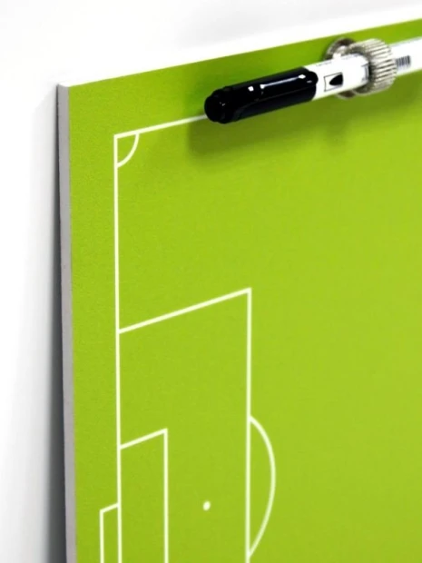 Tactical dry-erase coaching board for field hockey - Green surface with white graphics.