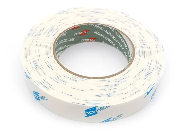 Oracal foam mounting tape 10 mm - Graphic design. White tape with blue and green text.