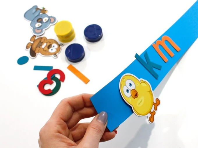 Self-adhesive magnetic strip for magnets, 60 cm - various colors - Graphic design on a blue background with colorful elements.
