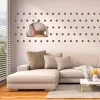 Dot stickers set 1998 - Styled in a living room with light walls, gray furniture, and wooden flooring.