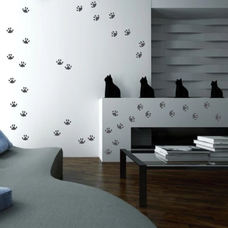 Cat paw print stickers set 1979 - Living room arrangement with light walls, dark furniture, and gray accents.