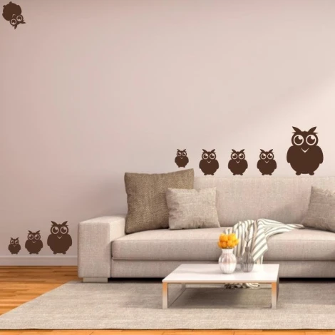 Owl stickers set 1975 - Living room decor with light-colored walls and a gray-beige sofa.