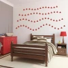 Boat stickers set 1977 - Bedroom decor with light walls and furniture in shades of red and brown.