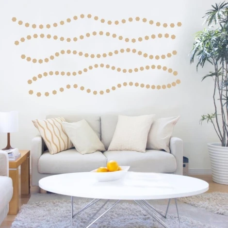 Hexagon stickers set 1985 - Living room decor with light-colored walls and beige and white furniture.