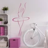Ballet dancer wall sticker 2026 - Room decor with light-colored walls and pastel furniture.