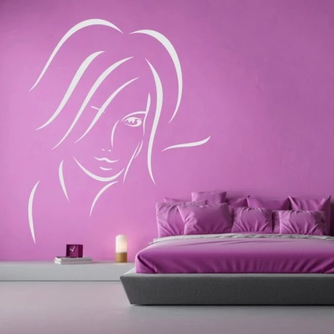 Decorative sticker of a woman\'s face 2033 - Bedroom decor with pink walls and a bed featuring a gray headboard.
