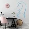 Decorative sticker female profile 2031 - Office arrangement with light-colored walls and minimalist furniture.