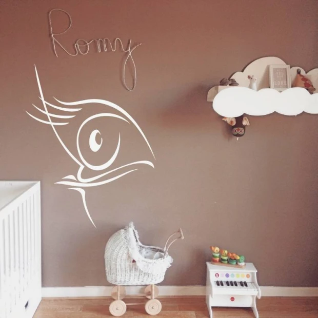 Decorative sticker eye 2030 - Ideal for a child\'s room with warm brown walls and minimalist furniture.